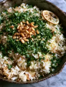 Macro shot of steaming rice pilaf with distinct grains, toasted vermicelli, and fresh parsley. (rice pilaf recipe)