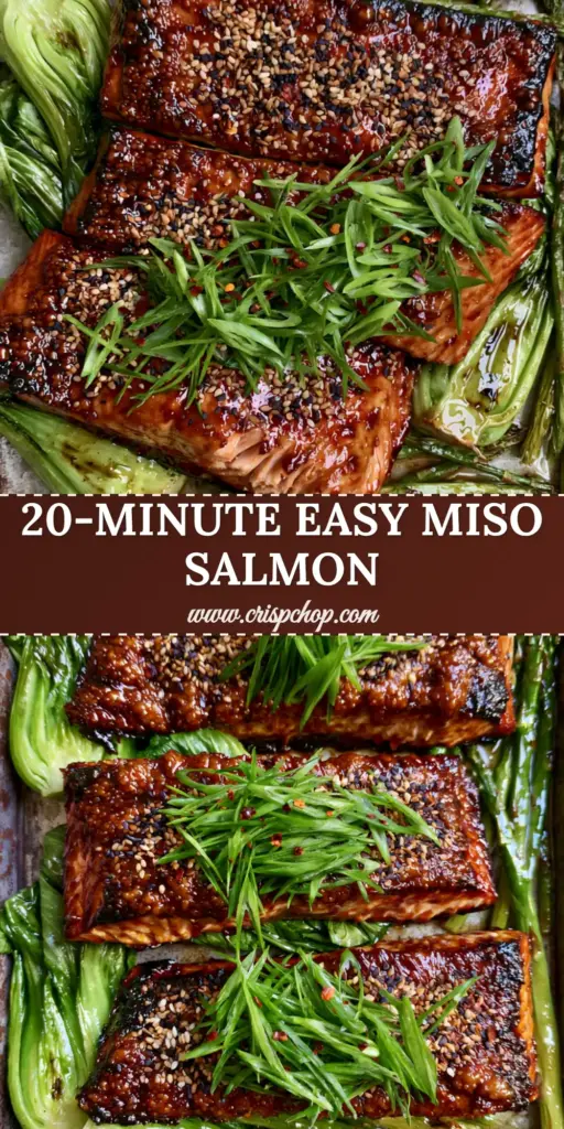 A top-down view of baked miso salmon fillets on a dark sheet pan with charred bok choy and asparagus, garnished with sesame seeds and scallions.