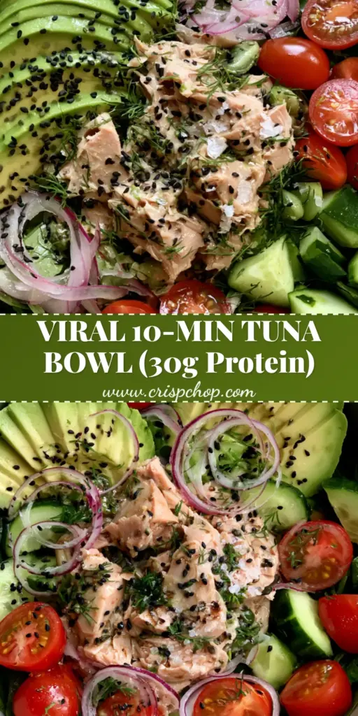 Top-down view of a vibrant tuna avocado bowl in a white ceramic dish with lemon-tahini dressing, sesame seeds, and fresh dill. (tuna avocado bowl)