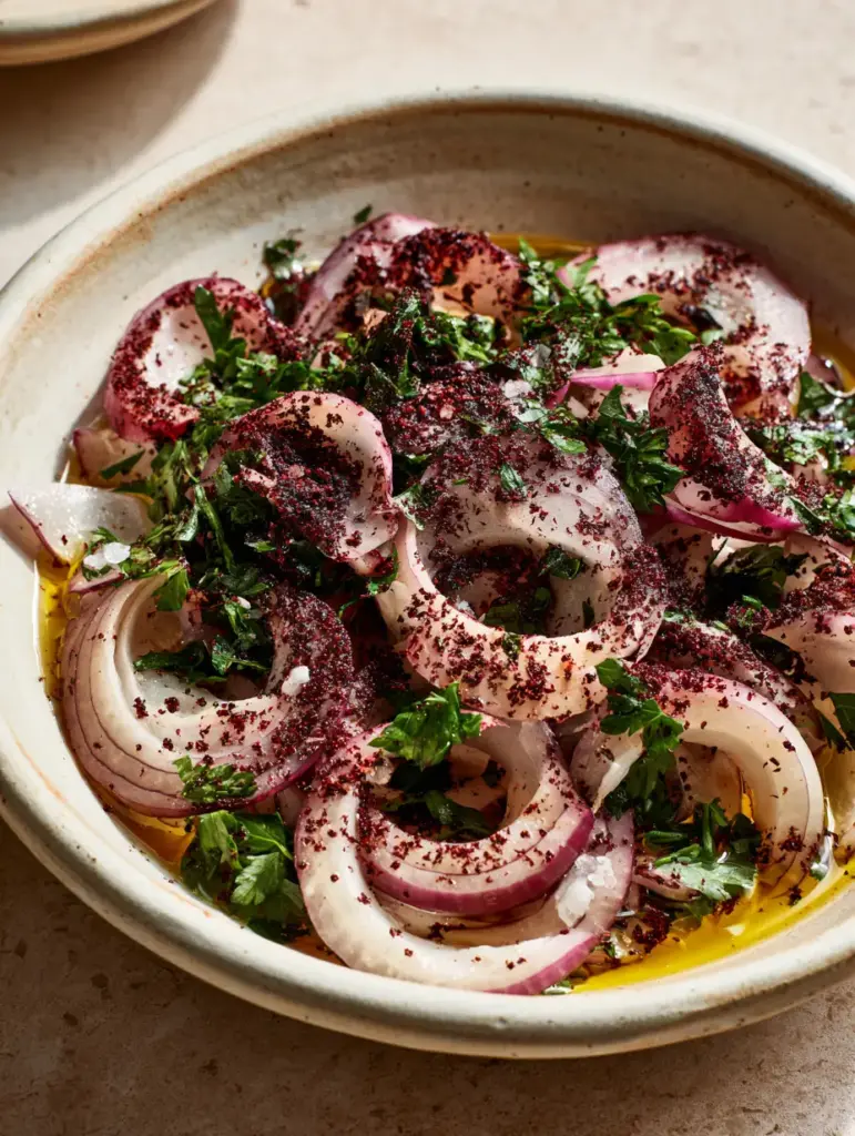 Turkish Onion Salad (Sumac Onions): The Ultimate Vibrant Side Dish 1 Rustic ceramic bowl overflowing with Turkish onion salad, featuring bright green parsley and a golden olive oil drizzle.