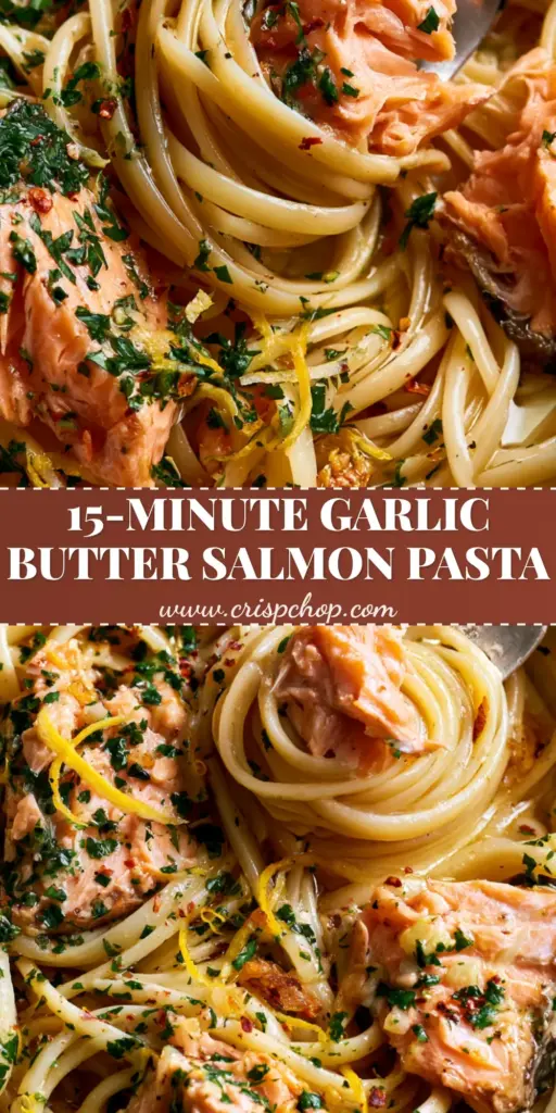 Canned Salmon Pasta with Garlic Butter and Lemon 3 A close-up of a fork lifting glistening al dente linguine and a large seared pink salmon flake from a bowl of canned salmon pasta.
